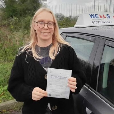 Student with pass certificate