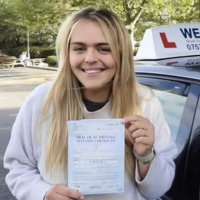 Student with pass certificate