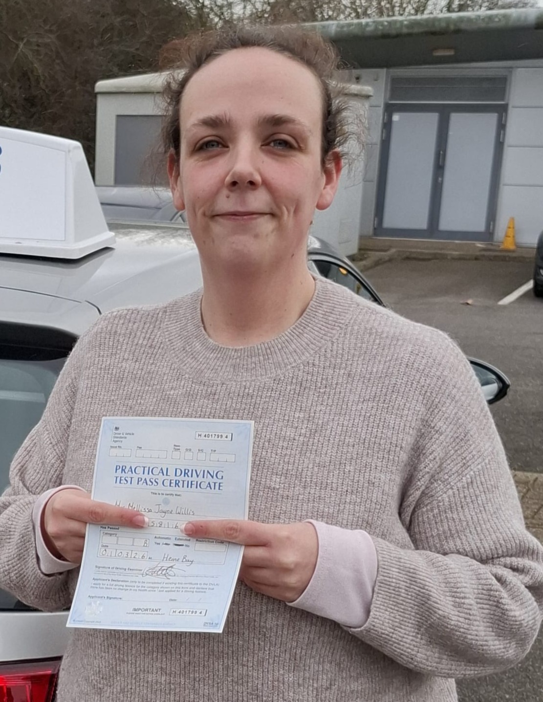 Student with pass certificate