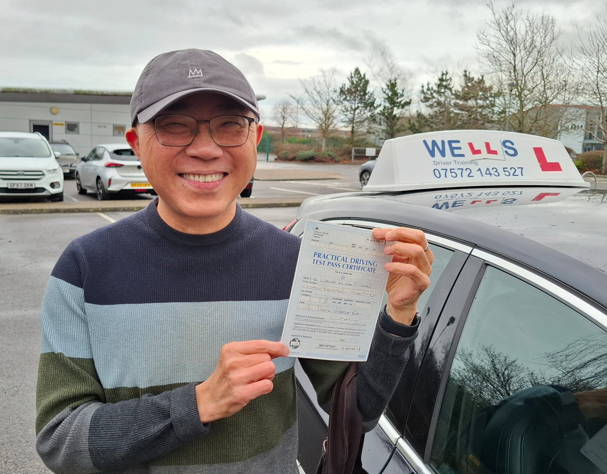 Student with pass certificate