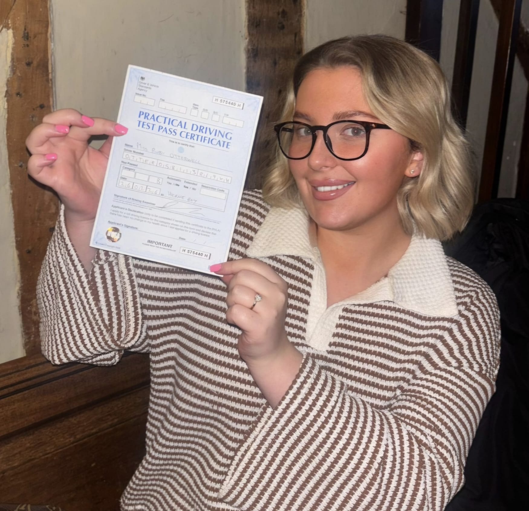 Student with pass certificate